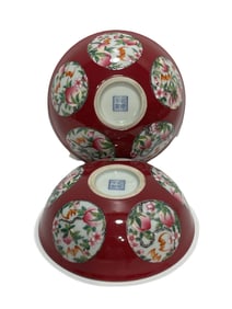 A pair of rainbow-red window-cut longevity peach bowls