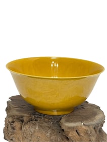 Yellow-glazed bowl with engraved dragon pattern