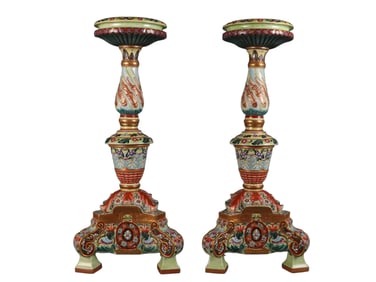 A pair of yellow ground and gold-painted enamel candlesticks with lotus petals