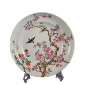 A famille rose plate with flower and bird patterns
