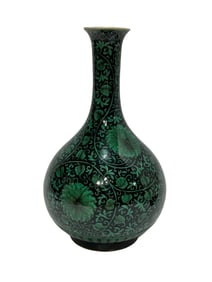 Black ground green colored floral pattern vase