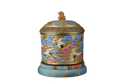 Gilded relief crane