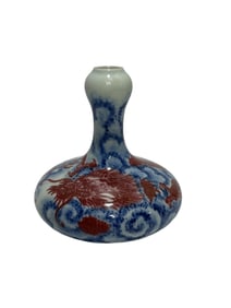 Small flat belly with blue and white underglaze red dragon pattern