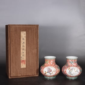 A pair of famille rose inlaid flower and bird vases