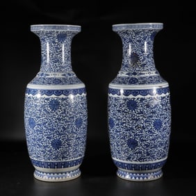 Blue and white floral vase (one repaired)