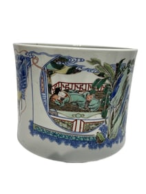 Blue and white multicolored figure pen holder
