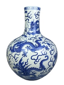 Blue and white celestial globe vase with nine dragon patterns on sea water.
