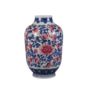 A blue and white jujube jar with rouge-red lotus pattern