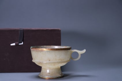 Ancient jade cup inlaid with gold