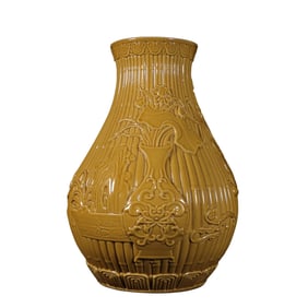 Chicken-oil yellow glaze vase with carved Bogu patterns