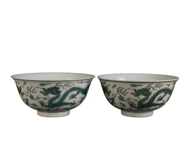 A pair of green-glazed dragon and cloud pattern bowls