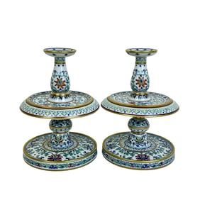 Doucai candlestick with intertwined floral pattern.