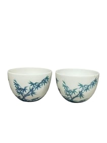 A pair of Doucai pine, bamboo and plum blossom cups