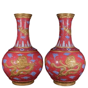 Blue and white porcelain vase with carved and gilded three dragons and two phoenixes