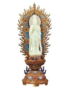 A gilded Buddha statue inlaid with Hetian jade