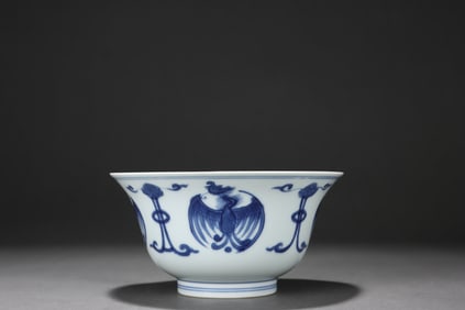 Blue and white porcelain cup with floral and phoenix design
