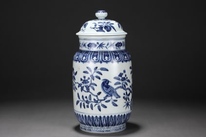 Blue and white porcelain covered jar with floral, fruit, and bird patterns