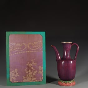 Jun ware rose-red glazed teapot with gold-inlaid clasp.