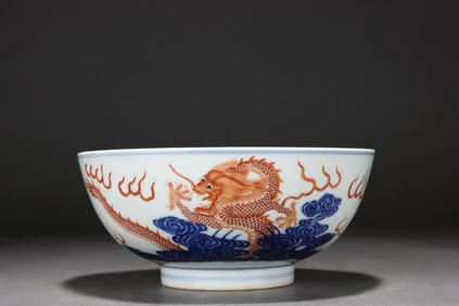 Blue and white underglaze red dragon and sea wave pattern bowl