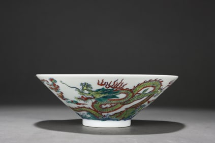 Doucai (enamel overglaze) bowl with dragon and sea wave design