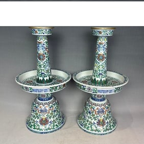 Blue and white doucai candlestick with lotus scroll, eight treasures and hidden eight immortals