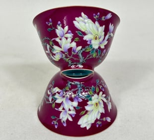 A pair of rouge-red enamel magnolia flower cups