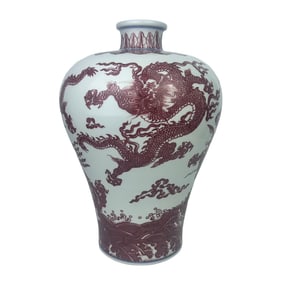 Underglaze red plum vase with five dragons amidst sea and clouds