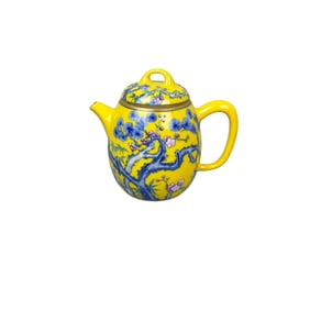 Yellow ground blue and white porcelain with famille rose enamels, a teapot with the Three Friends of