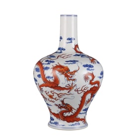 Blue and white porcelain vase with iron-red enamel cloud and dragon design