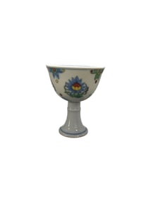 Blue and white melon-shaped vase with intertwined floral patterns