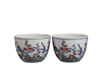 A pair of Doucai Magpie and Plum Blossom Cups