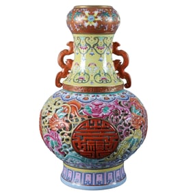 Yellow-ground famille rose enamel-painted gilt-carved openwork revolving vase with "Fu" character,
