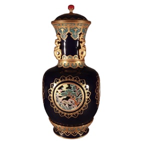 A square vase with openwork landscape painting in sacrificial blue and gold trim.