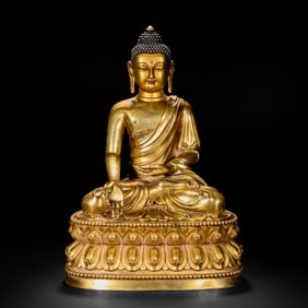 Gilded bronze Buddha statue