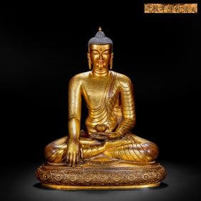 Gilded bronze Buddha statue