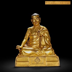 Gilded bronze statue of a guru