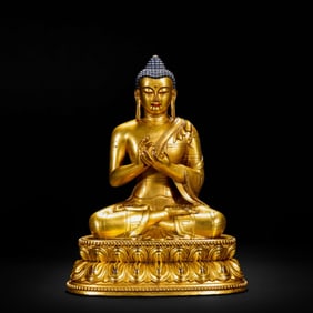 Gilded bronze Buddha statue