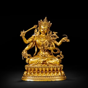 Gilded bronze Buddha statue