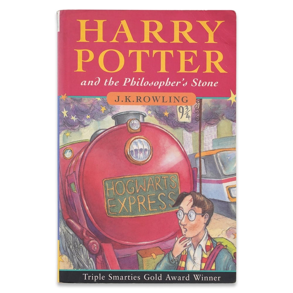 J. K. ROWLING SIGNED "HARRY POTTER AND THE PHILOSOPHER'S STONE" BLOOMSBURY EDITION: 7 5/8 x 5 in (19.5 x 12.8 cm) Few literary franchises in modern publishing history possess the worldwide influence and cultural impact of the Harry Potter series. As the novel that introduced the