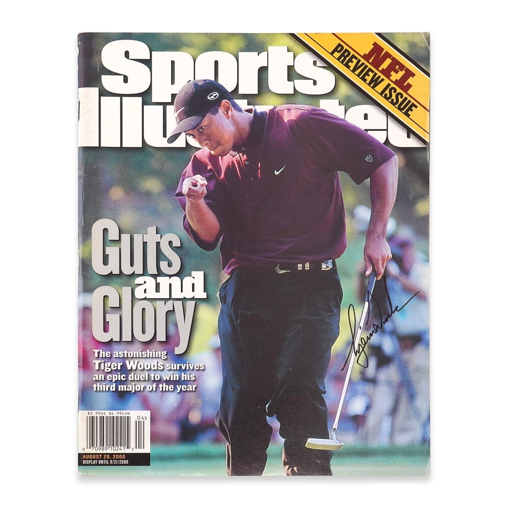 TIGER WOODS SIGNED "SPORTS ILLUSTRATED" MAGAZINE: 10 3/8 x 8 1/8 in (26.5 x 20.5 cm) Provenance and Authentication: This collectible has undergone a rigorous forensic evaluation. The signatures were carefully analyzed across multiple criteria,