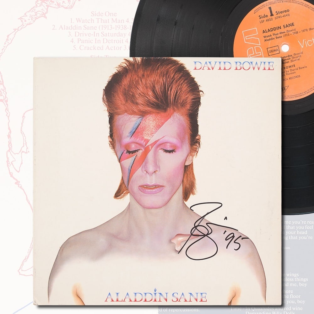 DAVID BOWIE SIGNED "ALADDIN SANE" LP: 12 1/4 x 12 1/4 in Provenance and Authentication: This collectible has undergone a rigorous forensic evaluation. The signatures were carefully analyzed across multiple criteria, including ink depositi