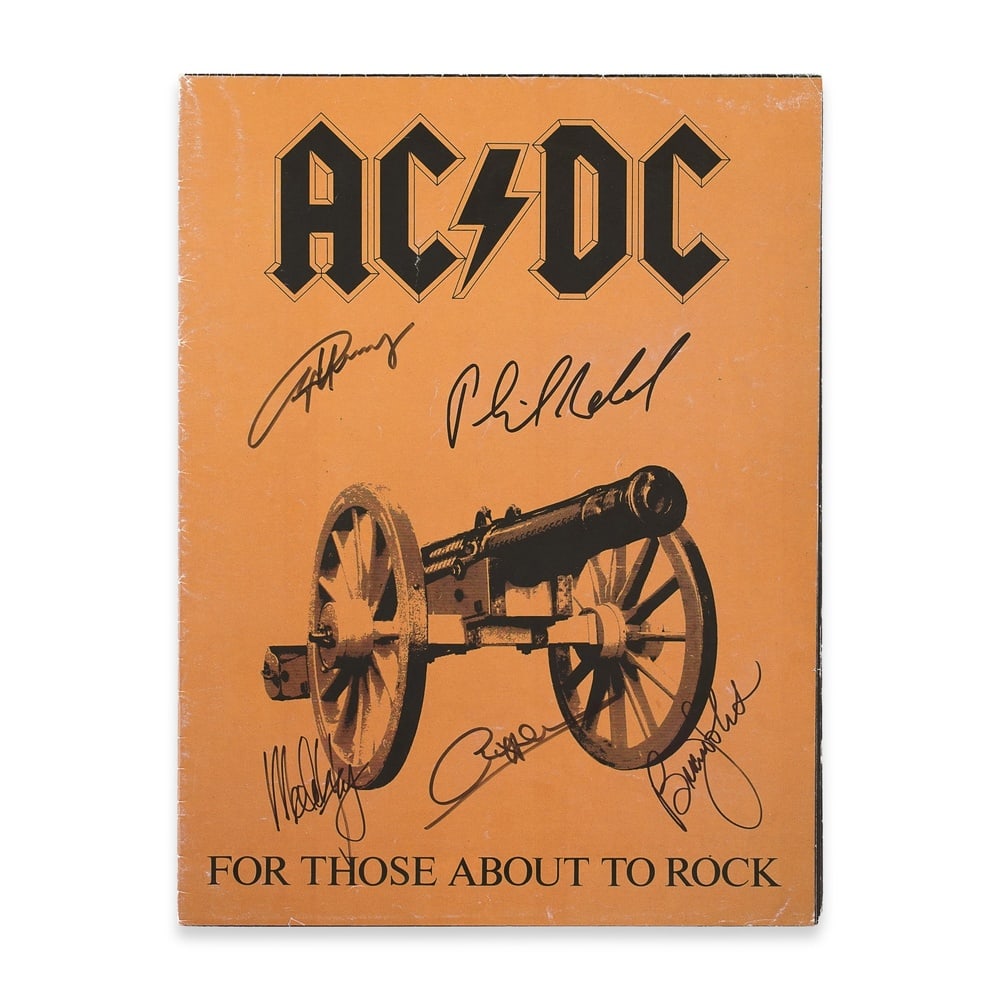 AC/DC SIGNED FOR THOSE ABOUT TO ROCK USA 1981 TOUR PROGRAM: 13 1/4 x 9 1/2 in (33.5 x 24.2 cm) Provenance and Authentication: This collectible has undergone a rigorous forensic evaluation. The signatures were carefully analyzed across multiple criteria,