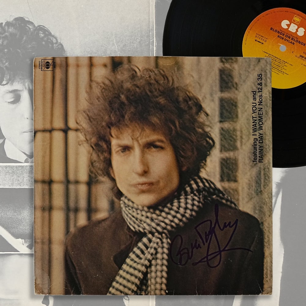 BOB DYLAN SIGNED "BLONDE ON BLONDE" LP: 12 1/4 x 12 1/4 in Provenance and Authentication: According to the Letter of Authenticity (LOA) and Certificate of Authenticity (COA) provided by the consignor, this collectible was subjected to a for