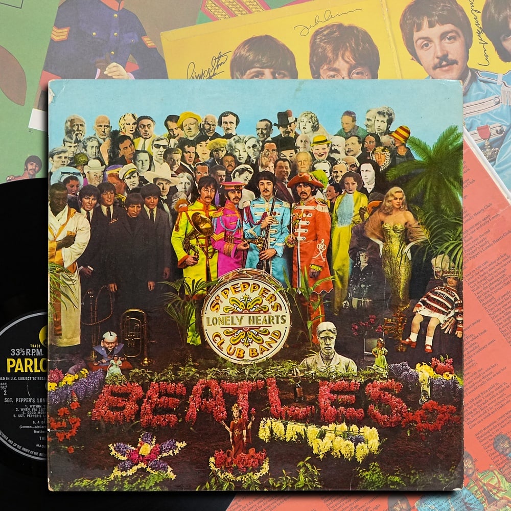 THE BEATLES FULLY SIGNED SGT. PEPPER'S LONELY HEARTS CLUB BAND FIRST PRESS UK LP: 12 1/4 x 12 1/4 Provenance and Authentication: According to the Letter of Authenticity (LOA) and Certificate of Authenticity (COA) provided by the consignor, this collectible was subjected to a forens