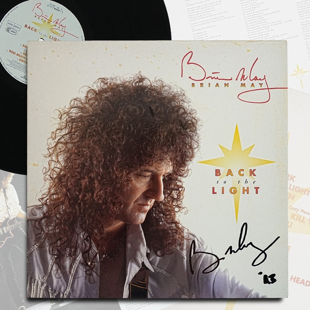 BRIAN MAY SIGNED "BACK TO THE LIGHT" UK LP: 12 1/4 x 12 1/4 Provenance and Authentication: According to the Letter of Authenticity (LOA) and Certificate of Authenticity (COA) provided by the consignor, this collectible was subjected to a