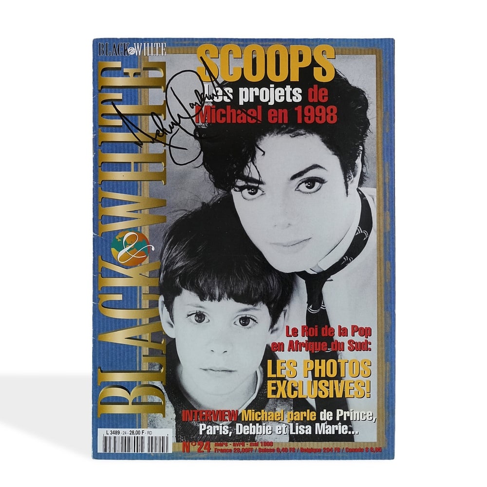MICHAEL JACKSON SIGNED "BLACK & WHITE" MAGAZINE: 11 3/4 x 8 3/8 in (29.7 x 21.3 cm) Provenance and Authentication: According to the Letter of Authenticity (LOA) and Certificate of Authenticity (COA) provided by the consignor, this collectible was su
