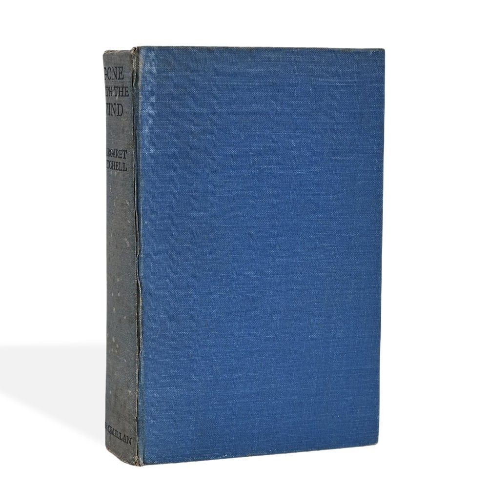 MARGARET MITCHELL SIGNED "GONE WITH THE WIND" HOLIDAY EDITION: 8 5/8 x 5 5/8 in (22 x 14.2 cm) Provenance and Authentication: According to the Letter of Authenticity (LOA) and Certificate of Authenticity (COA) provided by the consignor, this collectible was subje