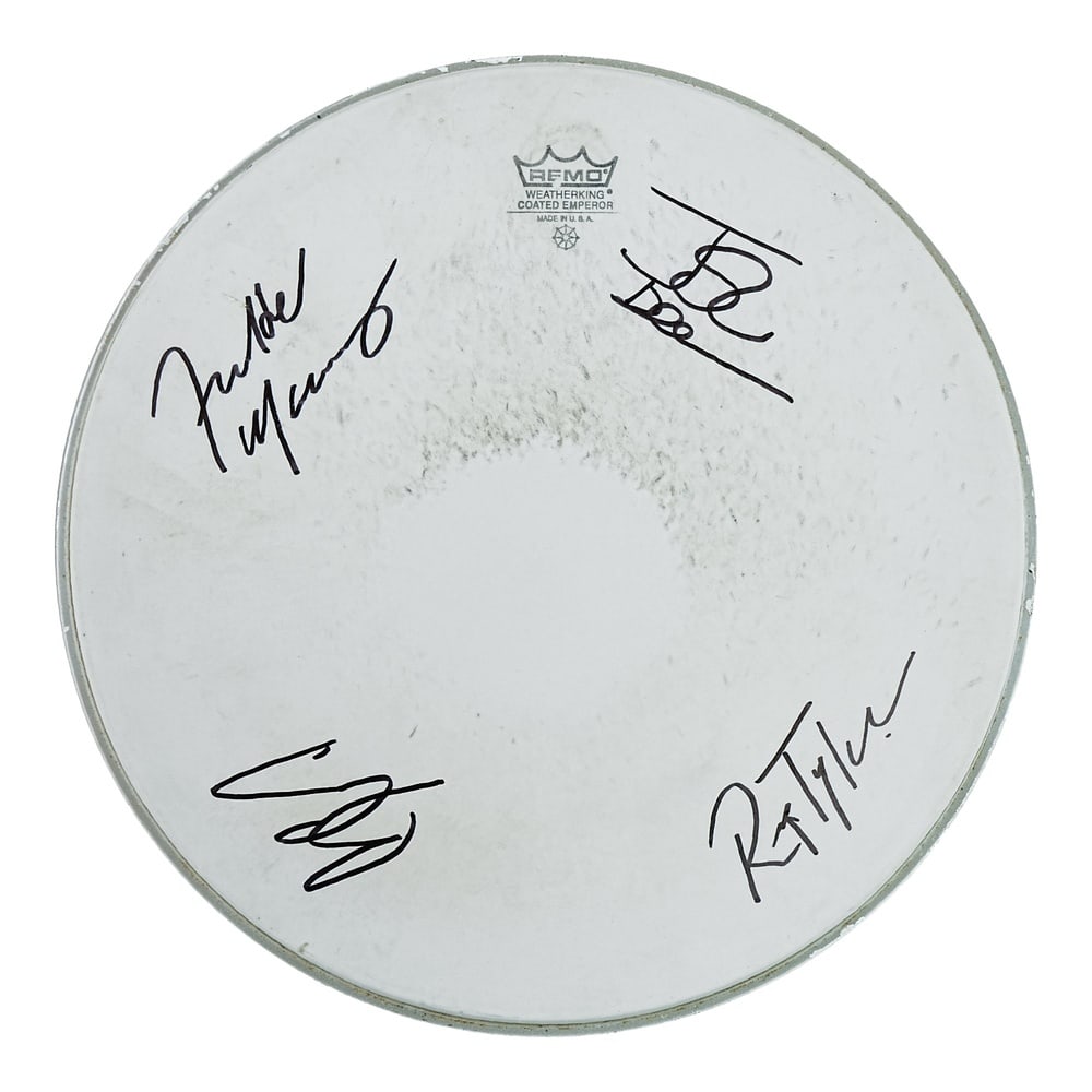 QUEEN FULLY SIGNED REMO DRUMHEAD: Diameter 14 in (35.5 cm) Few groups in popular music history have achieved the enduring cultural impact of Queen. This REMO drumhead features signatures attributed to all four members of the band's
