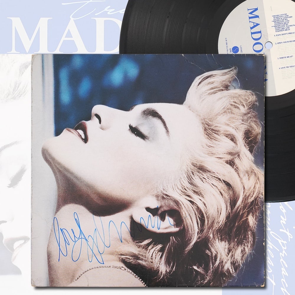 MADONNA SIGNED "TRUE BLUE" LP: 12 1/4 x 12 1/4 in Provenance and Authentication: According to the Letter of Authenticity (LOA) and Certificate of Authenticity (COA) provided by the consignor, this collectible was subjected to a