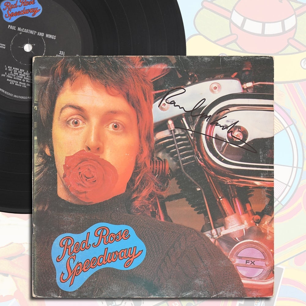 PAUL MCCARTNEY SIGNED "RED ROSE SPEEDWAY" LP: 12 1/4 x 12 1/4 in Provenance and Authentication: According to the Letter of Authenticity (LOA) and Certificate of Authenticity (COA) provided by the consignor, this collectible was subjected to a for